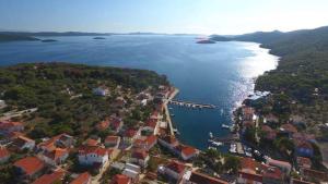 an aerial view of a town next to a body of water at Apartments Irena in Božava