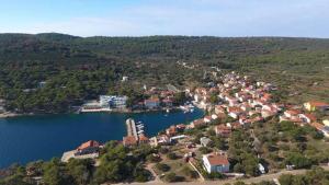 an aerial view of a small town next to a lake at Apartments Irena in Božava