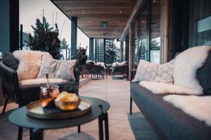 Predel za sedenje v nastanitvi Hotel Gappmaier