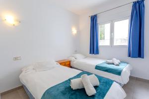A bed or beds in a room at Casa del Sol