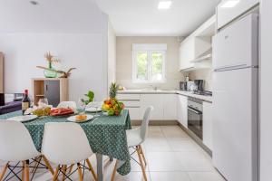 A kitchen or kitchenette at Casa del Sol