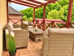 A seating area at Relax Wellness Apartman