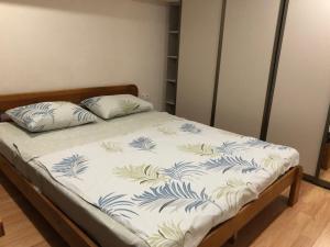 Кровать или кровати в номере Smart House