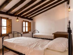 Säng eller sängar i ett rum på Casa peñuela