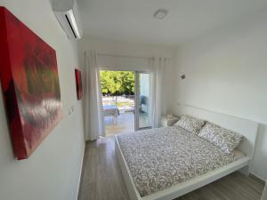 Postel nebo postele na pokoji v ubytování One Suite Punta Cana Presidential Suite