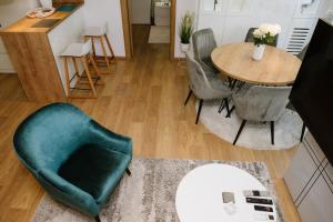 Posezení v ubytování Lusso Apartman
