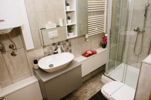 Koupelna v ubytování Lusso Apartman