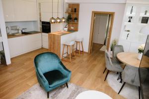 Kuchyň nebo kuchyňský kout v ubytování Lusso Apartman