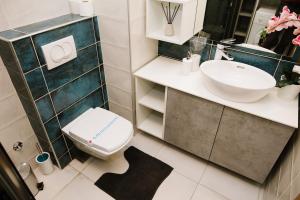 Koupelna v ubytování Lusso Apartman