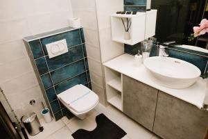 Koupelna v ubytování Lusso Apartman