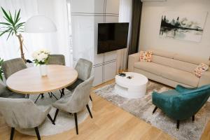 Posezení v ubytování Lusso Apartman