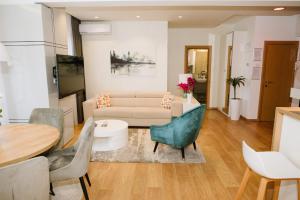 Posezení v ubytování Lusso Apartman + 35 fotografií