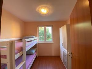 Posteľ alebo postele v izbe v ubytovaní Sea La Vie Holiday home with pool