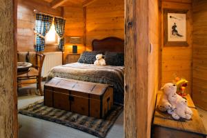 Postel nebo postele na pokoji v ubytování Chalet-Hôtel & Spa Les Cimes