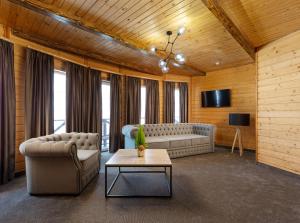 TV a/nebo společenská místnost v ubytování SVOI Hotel