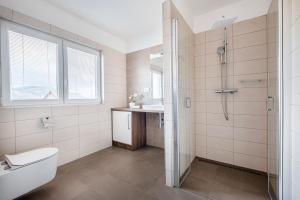 Koupelna v ubytování Apartmány ZaBukem