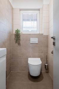 Koupelna v ubytování Apartmány ZaBukem