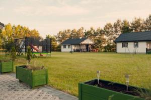 Zahrada ubytování Domki Letniskowe Aleksandra