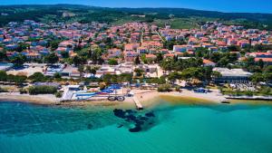 an aerial view of a small island in the water at Apartman Olive in Supetar