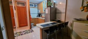 Kuchyňa alebo kuchynka v ubytovaní nikis Flat