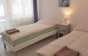Postel nebo postele na pokoji v ubytování Appartement Lehnbach