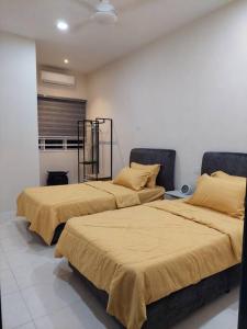 Postel nebo postele na pokoji v ubytování Yong Guesthouse
