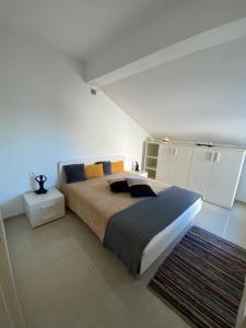 Łóżko lub łóżka w pokoju w obiekcie Apartman Viola Vižula