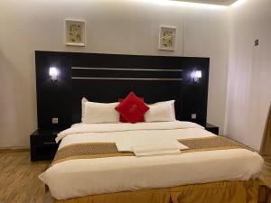Кровать или кровати в номере Vision 2 For Residential Units