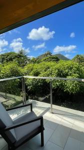 a view from the balcony of a house at Sol Sanctum - Boutique Wellness Hotel in Gros Islet