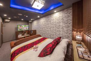 Katil atau katil-katil dalam bilik di Hotel ＧEM