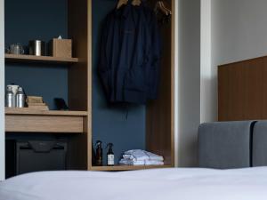 Voodi või voodid majutusasutuse Hotel Vison toas