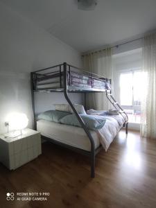 Postel nebo postele na pokoji v ubytování Casa de las Lanzas