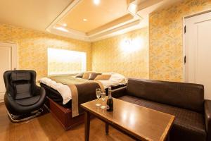Area soggiorno di ホテル ドルフィンリゾート 岐阜 -大人専用-