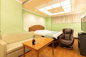 Area soggiorno di ホテル ドルフィンリゾート 岐阜 -大人専用-