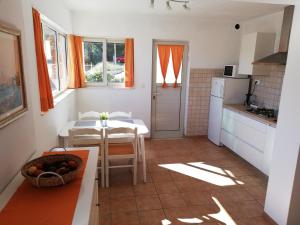 Kuchyň nebo kuchyňský kout v ubytování Shell Bay Apartments