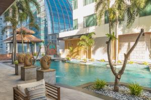 Bazén v ubytování Jasmine City Hotel nebo v jeho okolí