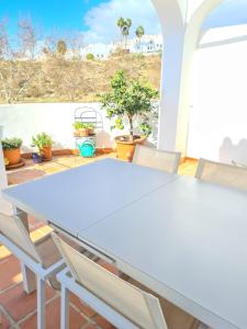 Fotografia z galérie ubytovania ADOSADO EN NERJA URB FLAMINGO v destinácii Nerja