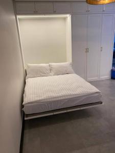 Posteľ alebo postele v izbe v ubytovaní MALAGA APARTAMENTY BALTICUS