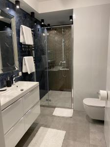 Kúpeľňa v ubytovaní MALAGA APARTAMENTY BALTICUS