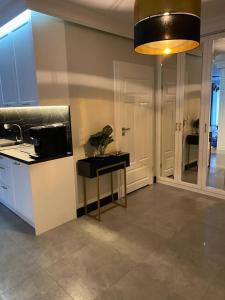 Kuchyňa alebo kuchynka v ubytovaní MALAGA APARTAMENTY BALTICUS