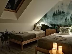 Кровать или кровати в номере Polne Zacisze