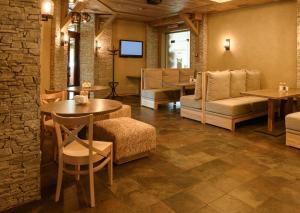 Posezení v ubytování Optima Collection Park Hotel Ivano-Frankivsk