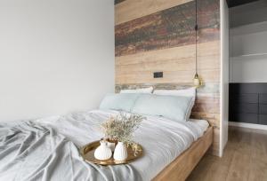 Posteľ alebo postele v izbe v ubytovaní Tuyo Apartments Lake park