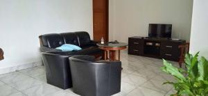 Posezení v ubytování Guest House Pinarak 2 Syariah near GOR Satria Purwokerto Mitra RedDoorz