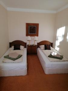 Posteľ alebo postele v izbe v ubytovaní Beatrix Apartments + 37 fotografií