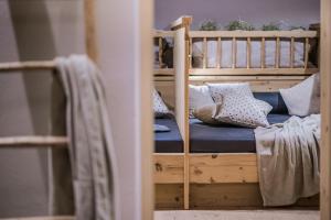 Postel nebo postele na pokoji v ubytování myLoisl Apartments