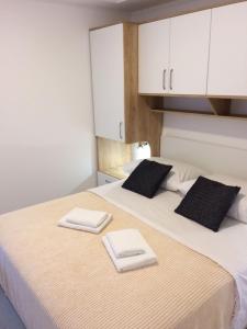 Postel nebo postele na pokoji v ubytování Apartment in Podgora with sea view, terrace, air conditioning, WiFi 4492-1