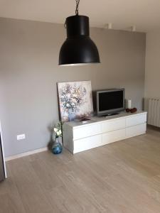 Televízia a/alebo spoločenská miestnosť v ubytovaní Ferienwohnung in Podgora mit Meerblick, Terrasse, Klimaanlage, W-LAN 4492-3