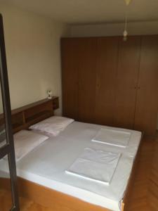 Postel nebo postele na pokoji v ubytování Apartment in Podgora with sea view, terrace, WiFi 4492-5