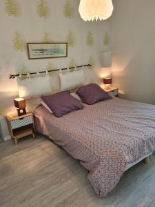 Postel nebo postele na pokoji v ubytování Gîte Camaloth - Closeries du Golfe